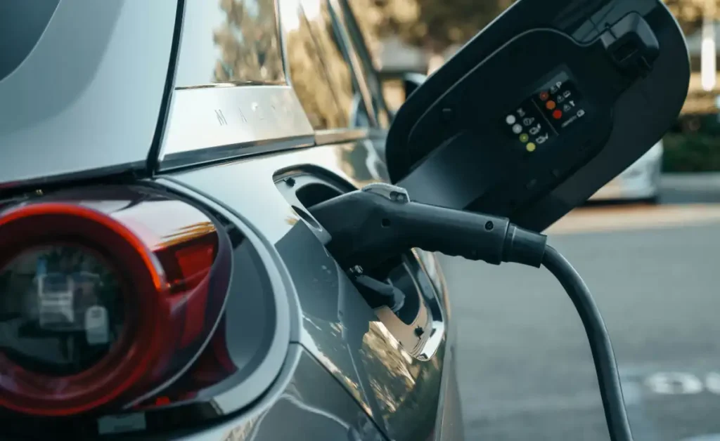 An EV charger plugged into a car